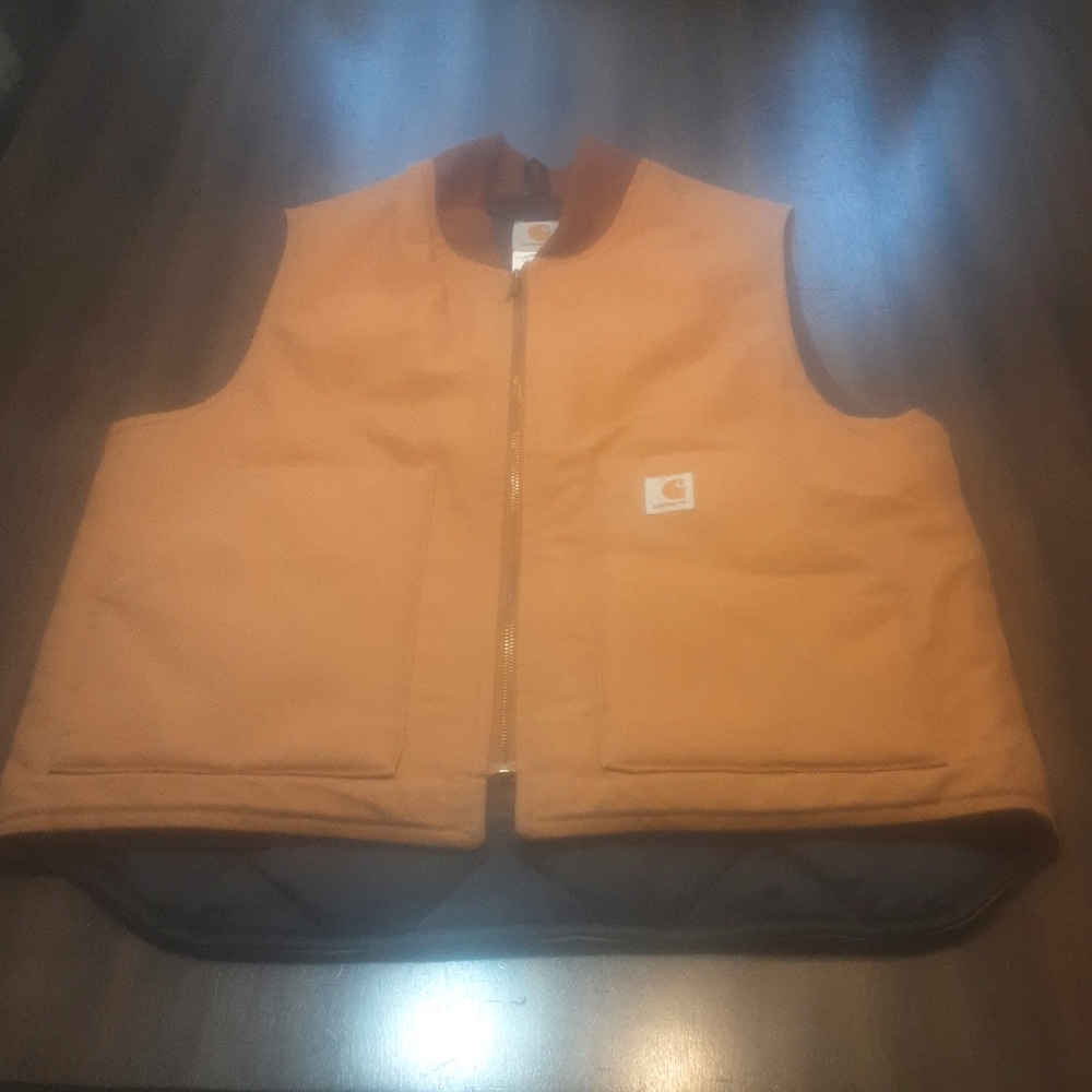Men's preowned Carhartt work vest L. $55.00 # 1241